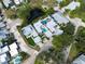 Aerial view of a home with a private pool and manicured lawn at 11213 Veranda Ct, Bradenton, FL 34209