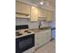 Kitchen boasts granite countertops and updated appliances at 1313 54Th E Ave # 1313, Bradenton, FL 34203