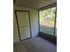 Screened porch with access to backyard at 1313 54Th E Ave # 1313, Bradenton, FL 34203