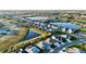 Aerial view of houses and lakes in a new community at 13930 Old Creek Ct, Parrish, FL 34219