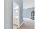 Hallway showing bathroom and bedroom access at 13930 Old Creek Ct, Parrish, FL 34219