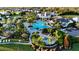 Resort-style pool and spa with lush landscaping, creating an inviting atmosphere at 13930 Old Creek Ct, Parrish, FL 34219