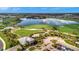 Community overview with golf course, lake, and clubhouse at 15415 Derna Ter, Bradenton, FL 34211