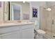 Bathroom with a vanity, toilet and a glass-enclosed shower at 15415 Derna Ter, Bradenton, FL 34211