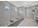 Spa-like bathroom with a large walk-in shower, soaking tub, and modern vanity at 15415 Derna Ter, Bradenton, FL 34211