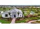 Community clubhouse with bocce ball courts and landscaping at 15415 Derna Ter, Bradenton, FL 34211