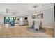 Bright dining area with glass-top table and wicker chairs at 15415 Derna Ter, Bradenton, FL 34211