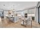 Spacious kitchen with white cabinets and large island at 15415 Derna Ter, Bradenton, FL 34211