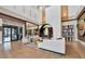 Spacious community clubhouse lobby featuring Olive & Vine market and seating areas at 15415 Derna Ter, Bradenton, FL 34211