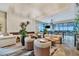 Spacious community lounge with modern furniture and a stunning chandelier at 15415 Derna Ter, Bradenton, FL 34211