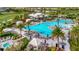 Relaxing resort-style pool with plenty of lounge chairs and umbrellas at 15415 Derna Ter, Bradenton, FL 34211