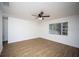 Spacious bedroom with light walls and wood floors at 1630 29Th St, Sarasota, FL 34234