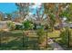 Charming bungalow with a fenced yard and mature trees at 1802 Cocoanut Ave, Sarasota, FL 34234