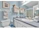 Clean bathroom with single sink vanity and shower at 2771 Golf Course Dr # 101, Sarasota, FL 34234