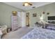 Guest bedroom with a dresser and full-size bed at 2771 Golf Course Dr # 101, Sarasota, FL 34234