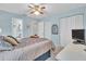 Spacious bedroom with a queen bed and built-in closet at 2771 Golf Course Dr # 101, Sarasota, FL 34234