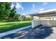 Covered carport with additional parking space at 2771 Golf Course Dr # 101, Sarasota, FL 34234