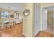 Dining area with hardwood floors, white table, and chairs at 2771 Golf Course Dr # 101, Sarasota, FL 34234