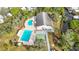 Aerial view of community pool, clubhouse, shuffleboard, and other amenities at 3333 26Th E Ave # 1040, Bradenton, FL 34208