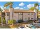 Condo building with palm trees and parking at 3775 59Th W Ave # 4128, Bradenton, FL 34210