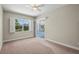 Bedroom with carpet, window shutters, and access to the pool at 4931 Flagstone Dr, Sarasota, FL 34238