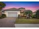 Attractive single-story home with stone accents and landscaping at 5011 Tivoli Run, Bradenton, FL 34211