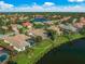 An aerial view showcasing the property's location on the water with a detailed boundary line at 518 Luminary Blvd, Osprey, FL 34229