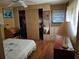 Comfortable bedroom with a closet and wood-look floors at 5504 Bermuda Ct, Bradenton, FL 34207