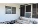 Mobile home exterior with covered entryway and landscaping at 5504 Bermuda Ct, Bradenton, FL 34207