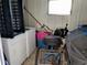Small laundry room with washer, dryer, and storage at 5504 Bermuda Ct, Bradenton, FL 34207