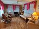 Spacious living room with hardwood floors and comfy seating at 5504 Bermuda Ct, Bradenton, FL 34207
