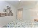 Charming bedroom with a queen bed and built in closet at 6055 Worsham Ln # 104, Lakewood Ranch, FL 34211