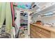 Large closet with shelving, drawers, and hanging rods at 6055 Worsham Ln # 104, Lakewood Ranch, FL 34211