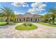 Community clubhouse with circular driveway at 6055 Worsham Ln # 104, Lakewood Ranch, FL 34211