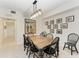 Farmhouse style dining table with six chairs at 6055 Worsham Ln # 104, Lakewood Ranch, FL 34211