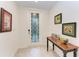 Bright entryway with decorative console table at 6055 Worsham Ln # 104, Lakewood Ranch, FL 34211