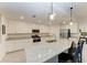 Gourmet kitchen featuring granite countertops and ample white cabinetry at 6055 Worsham Ln # 104, Lakewood Ranch, FL 34211