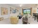 Spacious living room with built-in shelving and golf course view at 6055 Worsham Ln # 104, Lakewood Ranch, FL 34211