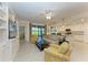 Open living area with a view of the kitchen at 6055 Worsham Ln # 104, Lakewood Ranch, FL 34211