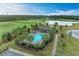 Resort-style pool with cabana and lush landscaping at 6055 Worsham Ln # 104, Lakewood Ranch, FL 34211