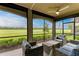 Relaxing screened patio overlooking a lush golf course at 6055 Worsham Ln # 104, Lakewood Ranch, FL 34211