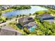 Aerial view of a backyard featuring a screened-in pool area and mature landscaping at 6318 Anise Dr, Sarasota, FL 34238