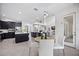 Combined kitchen and dining area featuring modern décor and ample lighting at 6318 Anise Dr, Sarasota, FL 34238