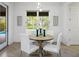 Bright dining area adjacent to a pool with a clear view of the outdoors at 6318 Anise Dr, Sarasota, FL 34238