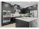 Close up of a modern kitchen, including stainless steel appliances and countertops at 6318 Anise Dr, Sarasota, FL 34238