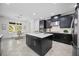 Spacious kitchen, including stainless steel appliances, island, and eating area at 6318 Anise Dr, Sarasota, FL 34238