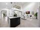 An open-concept floor plan showcasing a modern kitchen and stylish living room at 6318 Anise Dr, Sarasota, FL 34238
