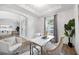 Bright office space featuring modern furnishings and plenty of natural light at 6318 Anise Dr, Sarasota, FL 34238