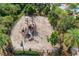 Large community playground with a variety of play structures and fenced perimeter at 6318 Anise Dr, Sarasota, FL 34238
