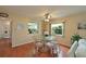 Cozy dining area with a view of the kitchen and entry way at 9411 Andover Cir, Bradenton, FL 34210